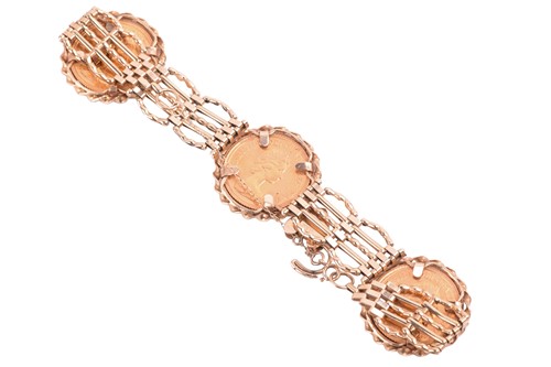 Lot 110 - A 9ct gold gate link bracelet mounted with...
