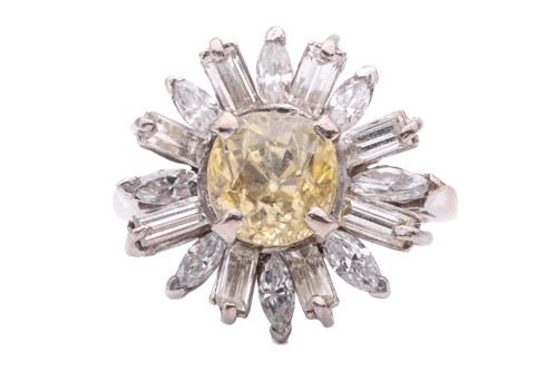 Lot 53 - A yellow sapphire and diamond daisy cluster...