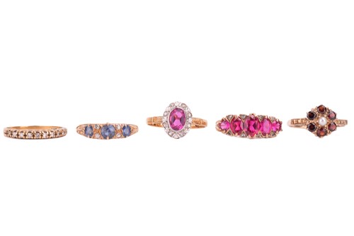 Lot 92 - A collection of five gem set rings, including...