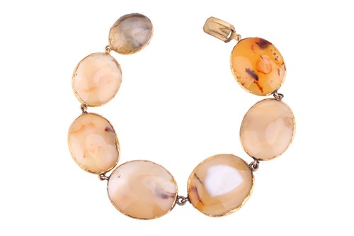 Lot 233 - An agate cabochon bracelet, comprising seven...