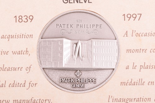Lot 328 - Original collectable silver medal Patek...