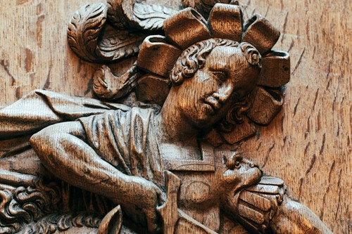 Lot 1 - A 17th-century carved-wood figure group,...