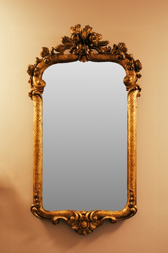 Lot 206 - An 18th-century French giltwood wall mirror,...