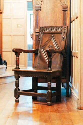 Lot 15 - A 17th-century oak wainscot chair, with carved...