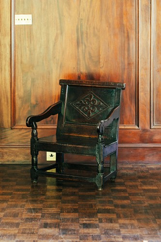 Lot 40 - A 17th-century oak wainscot chair, with...