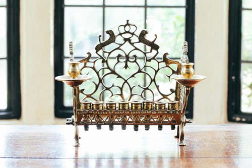 Lot 41 - An 18th century Dutch/German brass menorah,...