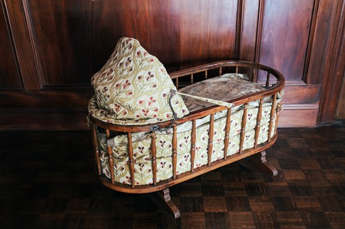 Lot 57 - An oak spindle frame child's cot, 19th century,...