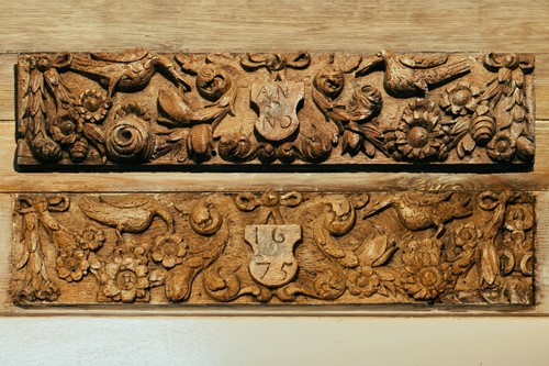 Lot 85 - A pair of 17th century oak carved panels, one...