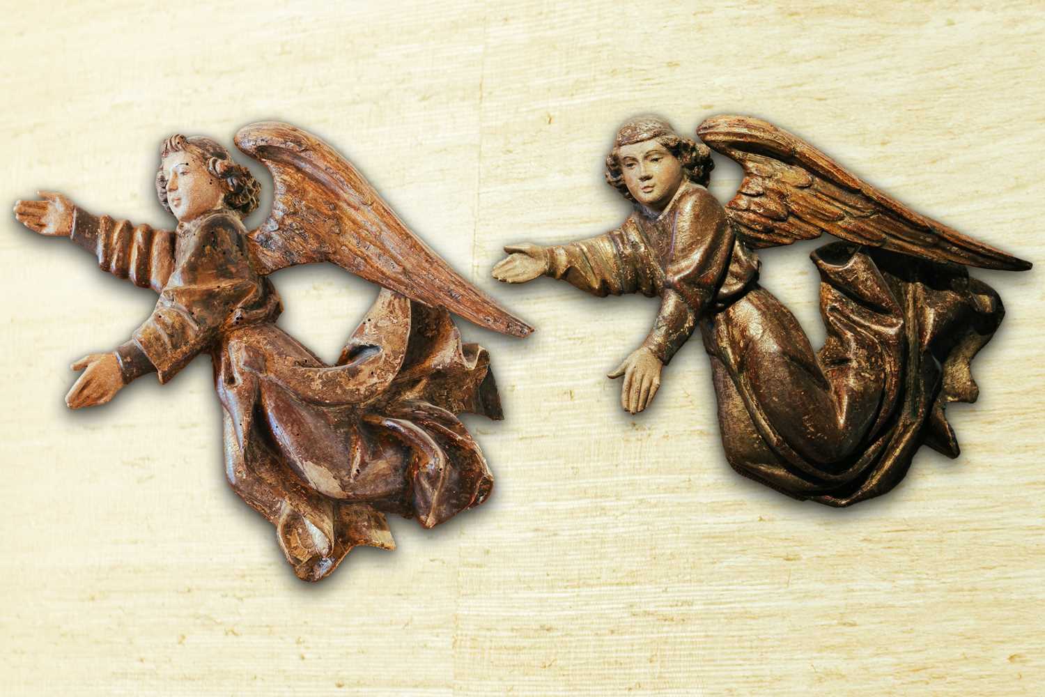 Lot 89 - A pair of painted softwood flying cherubs,...