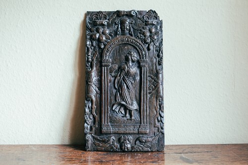 Lot 114 - A 17th century oak carved panel, depicting a...