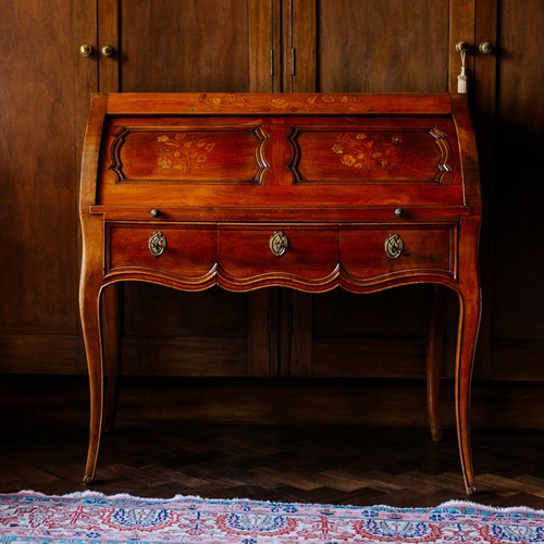 Lot 129 - A Louis XV fruitwood and marquetry inlaid...