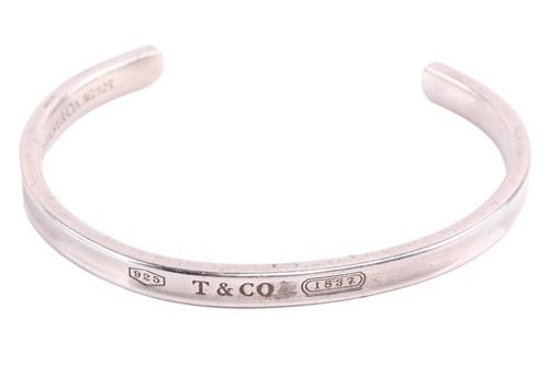 Lot 228 - Tiffany & Co. - an 1837 open cuff bangle, with...