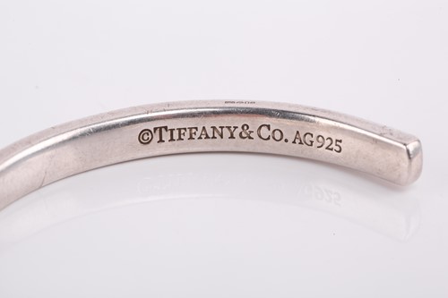 Lot 228 - Tiffany & Co. - an 1837 open cuff bangle, with...