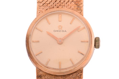 Lot 381 - A Lady’s Omega 9k yellow gold wristwatch, the...