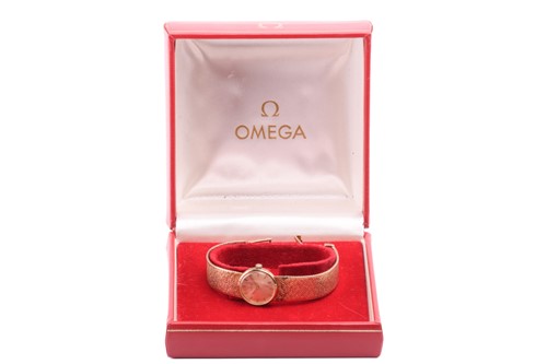 Lot 381 - A Lady’s Omega 9k yellow gold wristwatch, the...