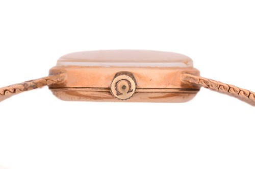 Lot 381 - A Lady’s Omega 9k yellow gold wristwatch, the...