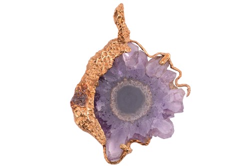 Lot 241 - A Modernist sliced amethyst stalactite pendant,...