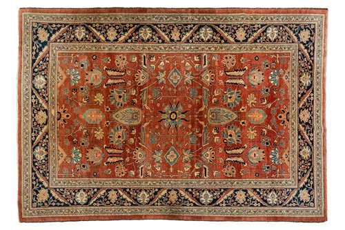 Lot 298 - A large brick red ground Serapi-style carpet ,...