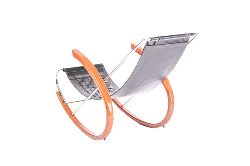 Lot 290 - A black leather 'Donna' Rocking chair by Elio...