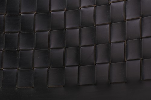 Lot 290 - A black leather 'Donna' Rocking chair by Elio...