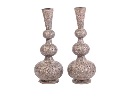 Lot 295 - A pair of Morrocan pierced and engraved brass...