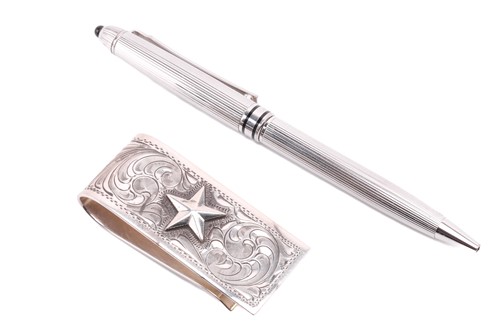 Lot 322 - A Mikimoto ballpoint pen and a money clip; the...