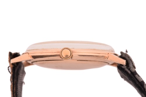 Lot 346 - A Doxa 14ct gold dress watch, featuring a...
