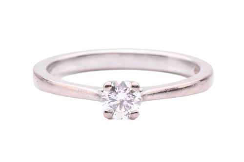 Lot 35 - A diamond solitaire ring, set with a round...