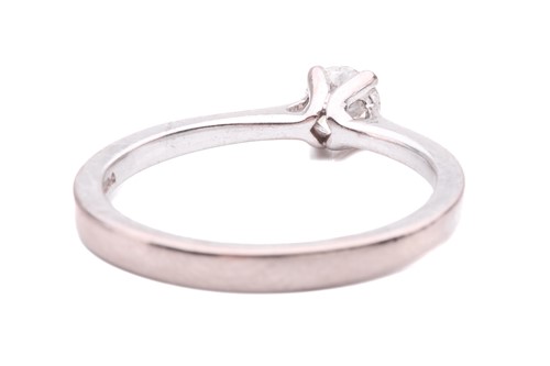 Lot 35 - A diamond solitaire ring, set with a round...