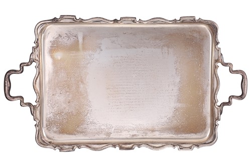 Lot 470 - A rectangular silver tea tray, with two shaped...