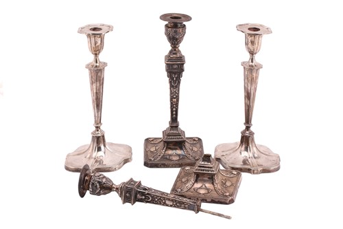 Lot 450 - A pair of Neo-Classical style candlesticks,...