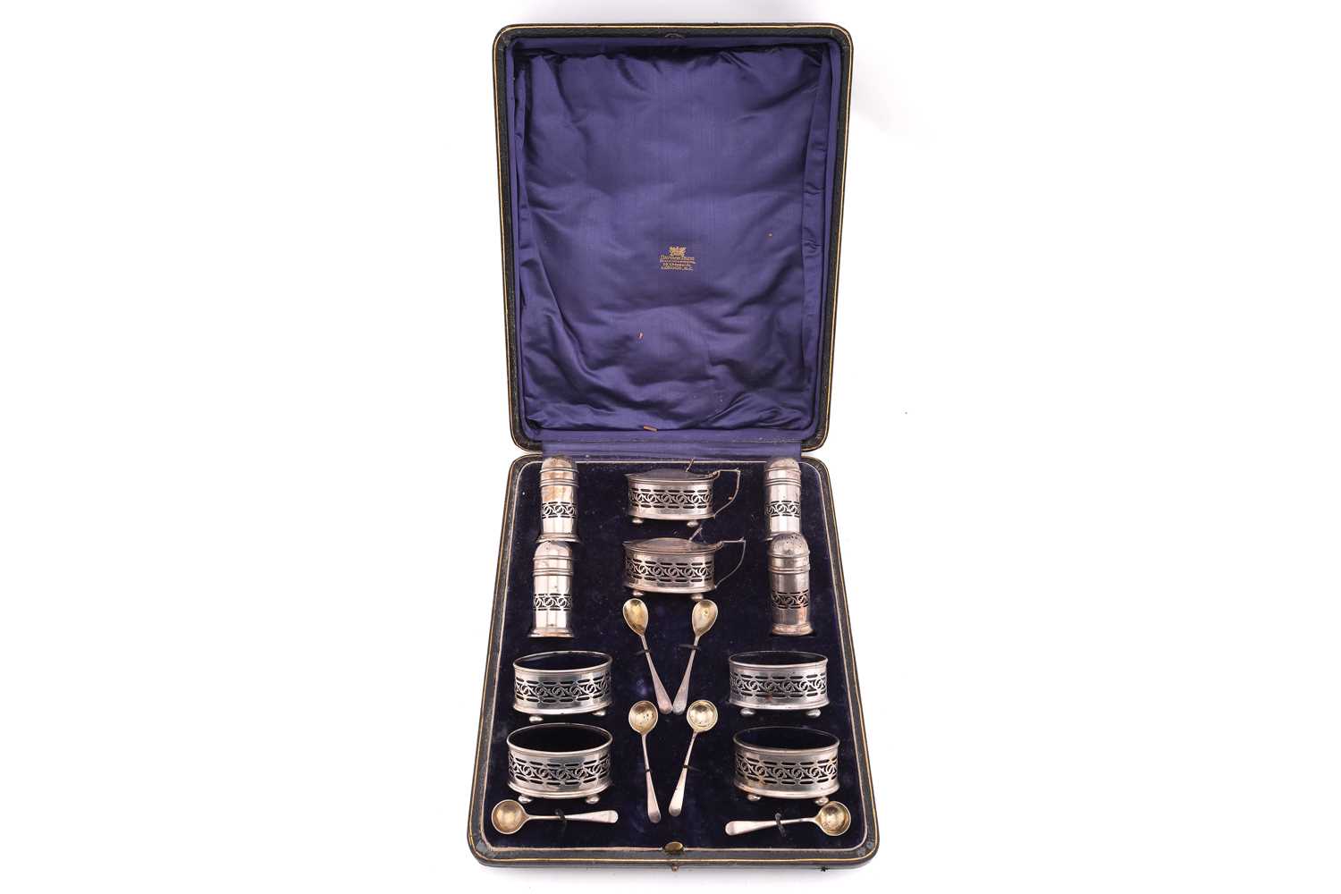 Lot 441 - A silver ten-piece condiment set in fitted