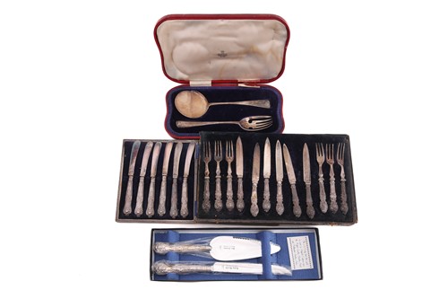 Lot 440 - Four cased sets of silver flatware comprising...