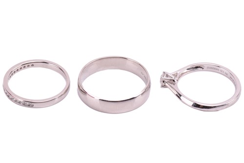 Lot 159 - Three platinum rings; including a diamond...