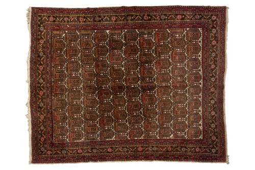 Lot 180B - An ivory ground Afshar rug with all over boteh...