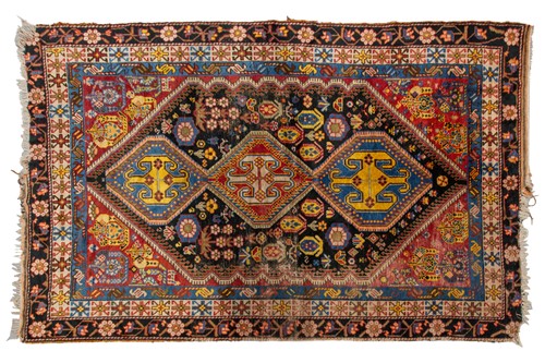 Lot 157 - An old blue/black ground Qashqai rug with...