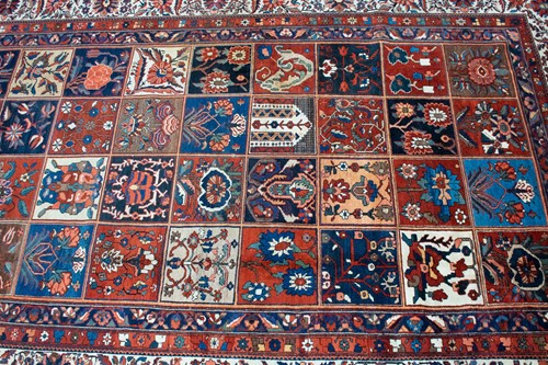Lot 155 - A large old Baktiari main carpet with a...