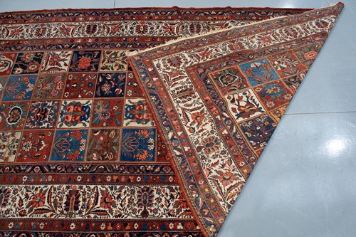 Lot 155 - A large old Baktiari main carpet with a...