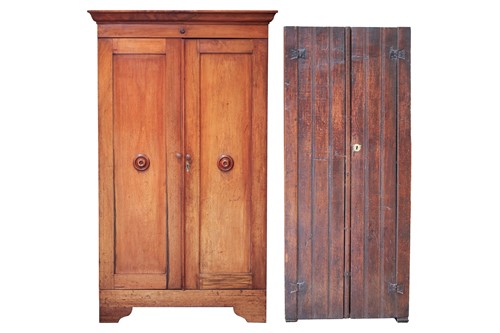 Lot 69 - A Victorian mahogany twin door cupboard, the...