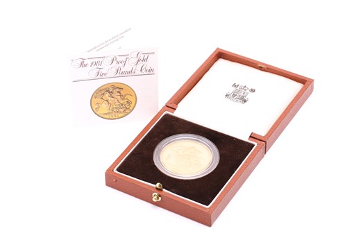 Lot 278 - The 1981 proof gold Five Pounds coin,...