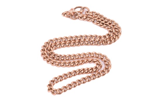 Lot 151 - A curb link chain in 9ct yellow gold,...