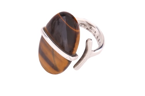 Lot 268 - Georg Jensen - a tiger's eye dress ring, to an...