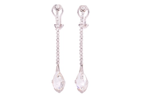Lot 96 - A pair of diamond drop earrings, suspended...