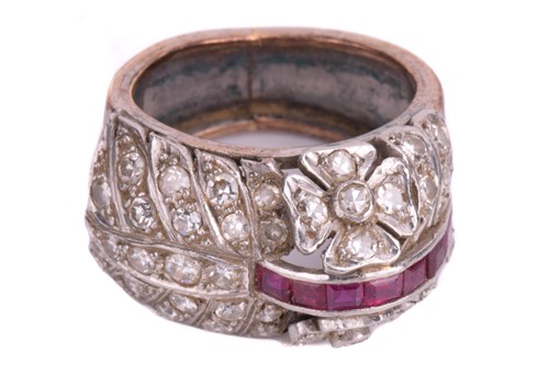 Lot 115 - An Art Deco ruby and diamond dress ring, circa...