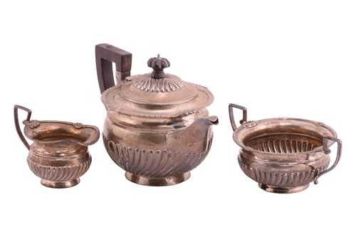 Lot 547 - A late Victorian silver three-piece tea...