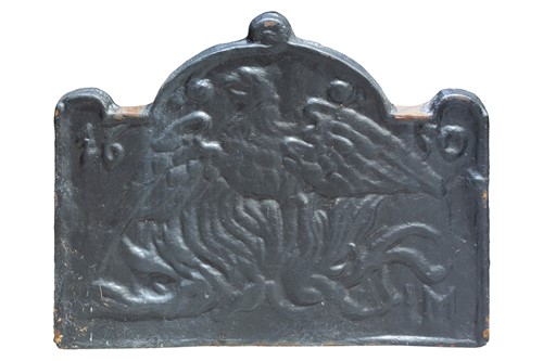 Lot 170 - A 17th century style cast iron fire back, the...