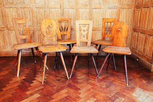 Lot 190 - Six Swiss Alpine folk chairs, with individual...