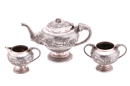 Lot 500 - An Indian silver-plated three-piece tea...