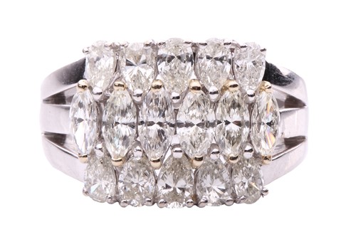 Lot 136 - A diamond dress ring, featuring three rows of...