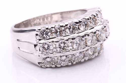 Lot 24 - A diamond dress ring, set with three rows of...